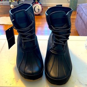 Tommy Hilfiger Duck Boots New has tag never worn. Black/Black with tan sole